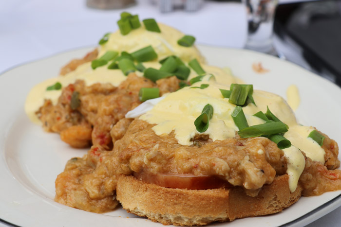 seafood eggs benedict at Court of Two Sisters restaurant in New Orleans Louisiana