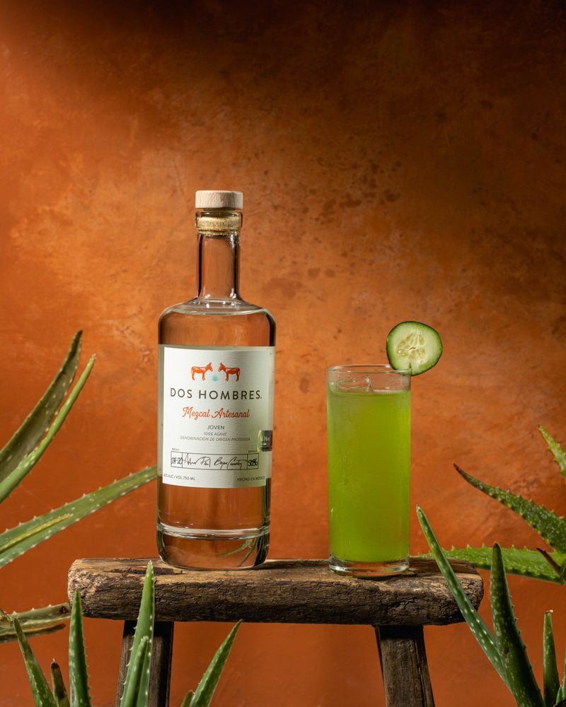 Nights Burn Bright green Dos Hombres mezcal cocktail with cucumber