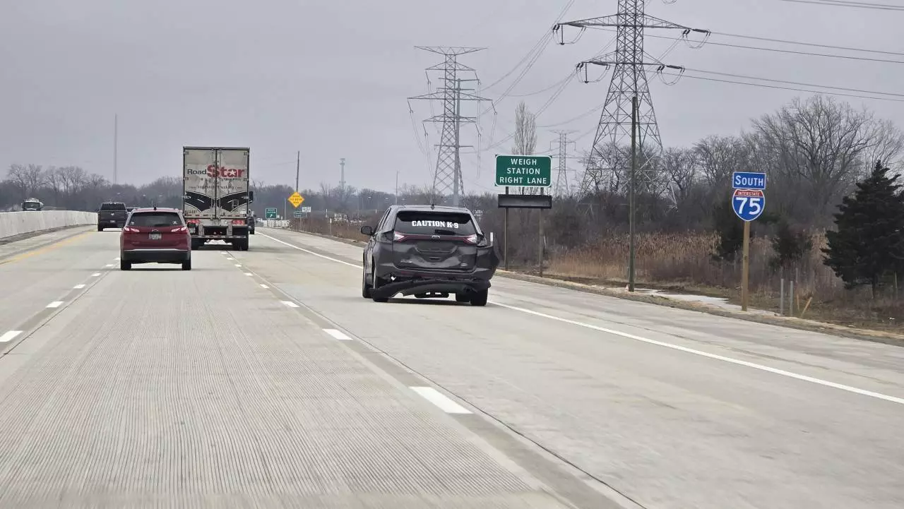damaged car on highway