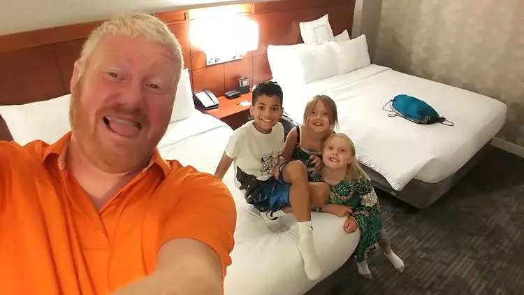 aaron with kids in hotel