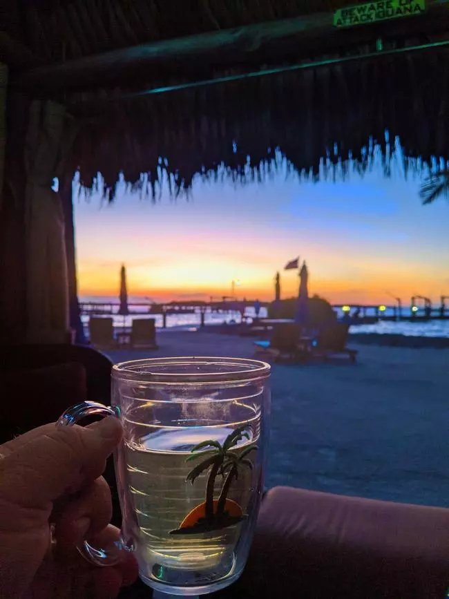 enjoying wine while watching the sun set