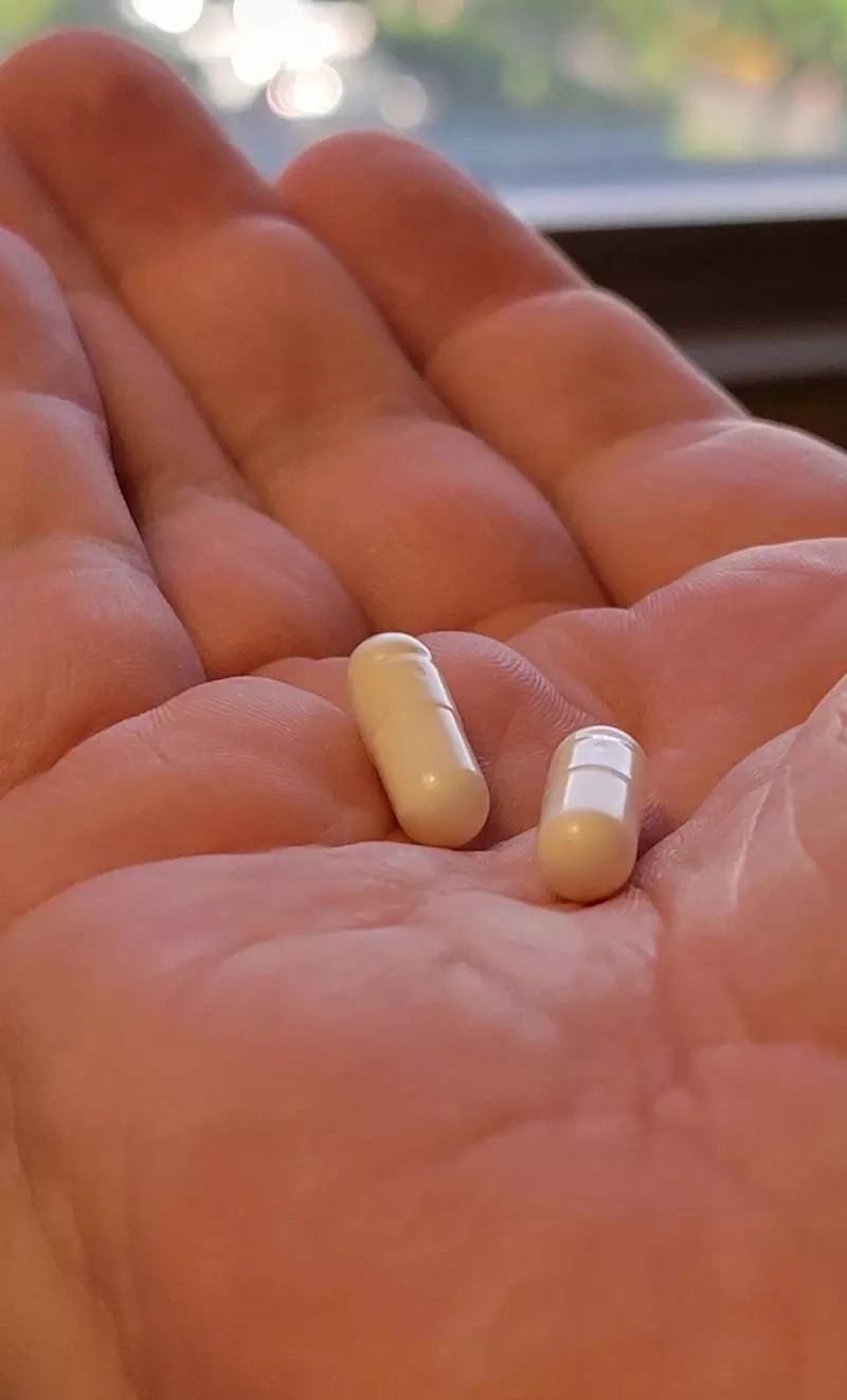 magnesium supplements in hand