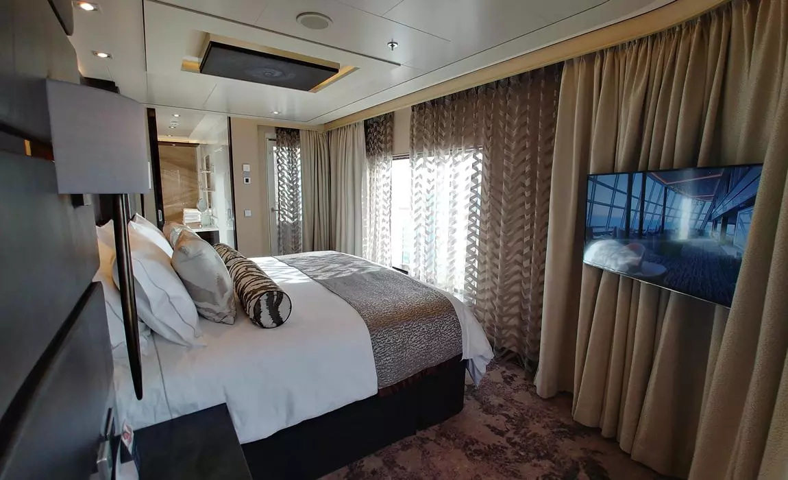 Norwegian Joy Haven Owner's Suite bedroom