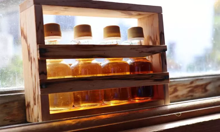 four different grades of maple syrup