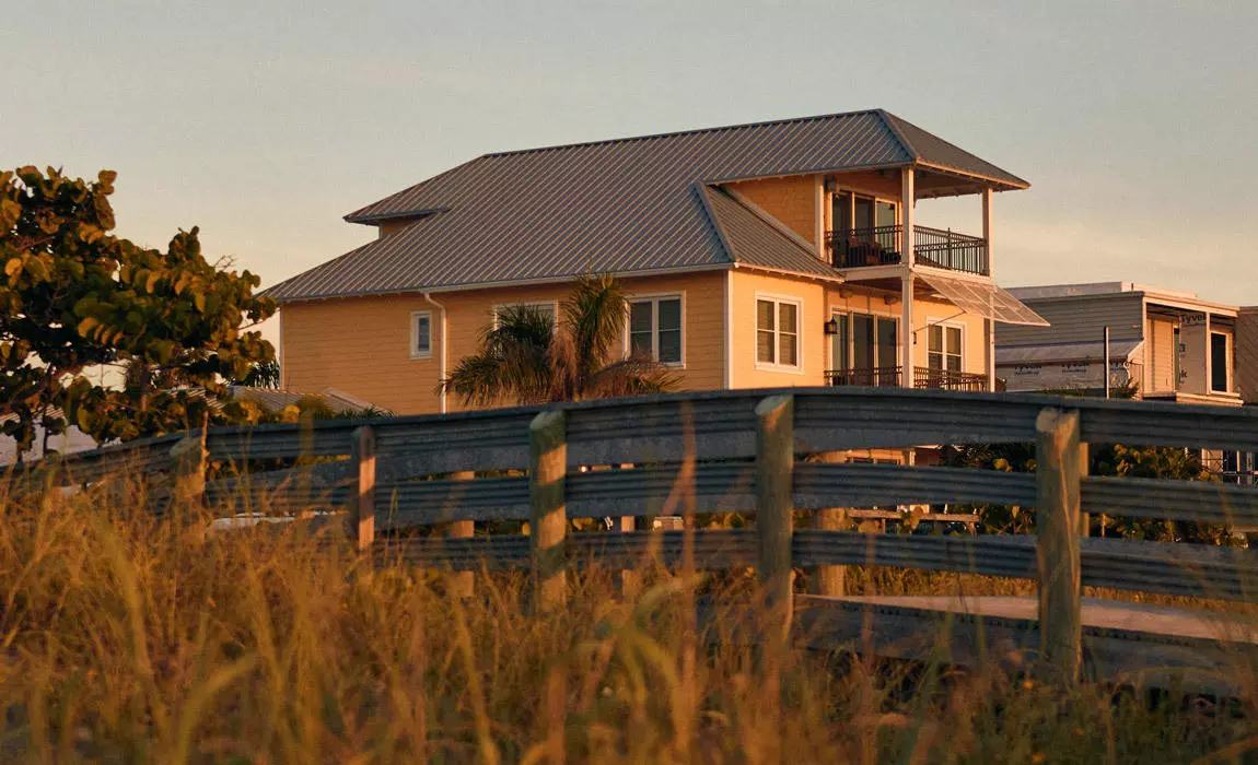 buy a beach house as a weekend home