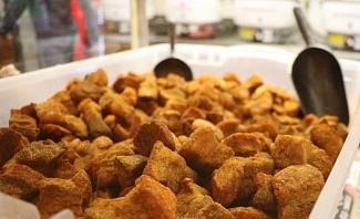 Cracklins are just one of the man-friendly foods you'll need to try when visiting Lafayette, Louisiana on a guys weekend.