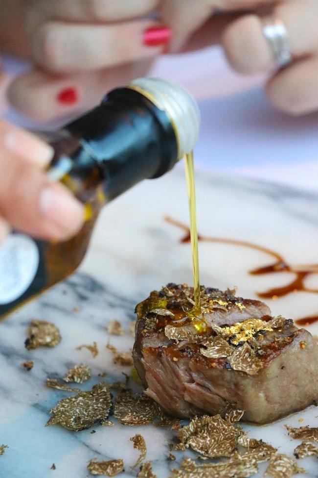 adding olive oil to wagyu