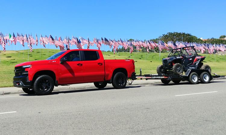 2019 chevy silverado trail boss in front of flags displayed at pepperdine university la