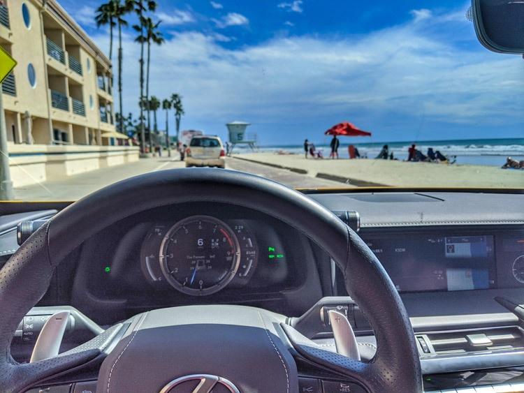 steering wheel of lexus lc500 in oceanside california san diego beach town