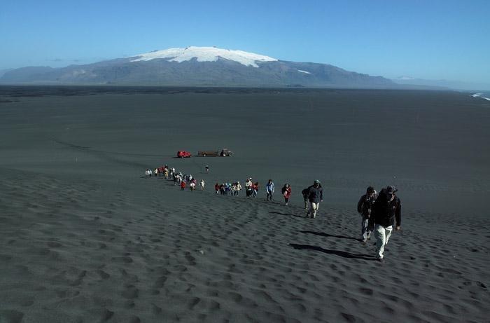 hiking volcanic sand in iceland