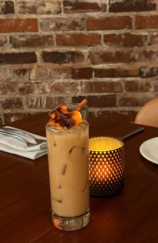 Horchata Cosecha cocktail with a dehydrated sweet potato garnish