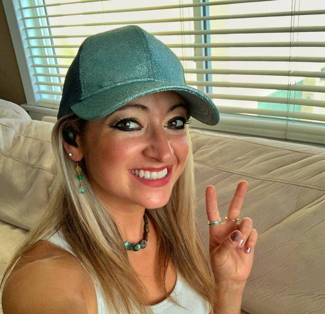 Ashley wearing AU-Stream Hybrid Earbuds