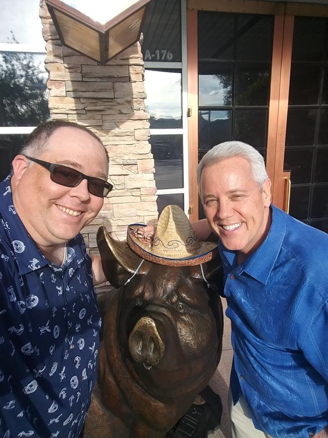 james and patrick by babe pig statue