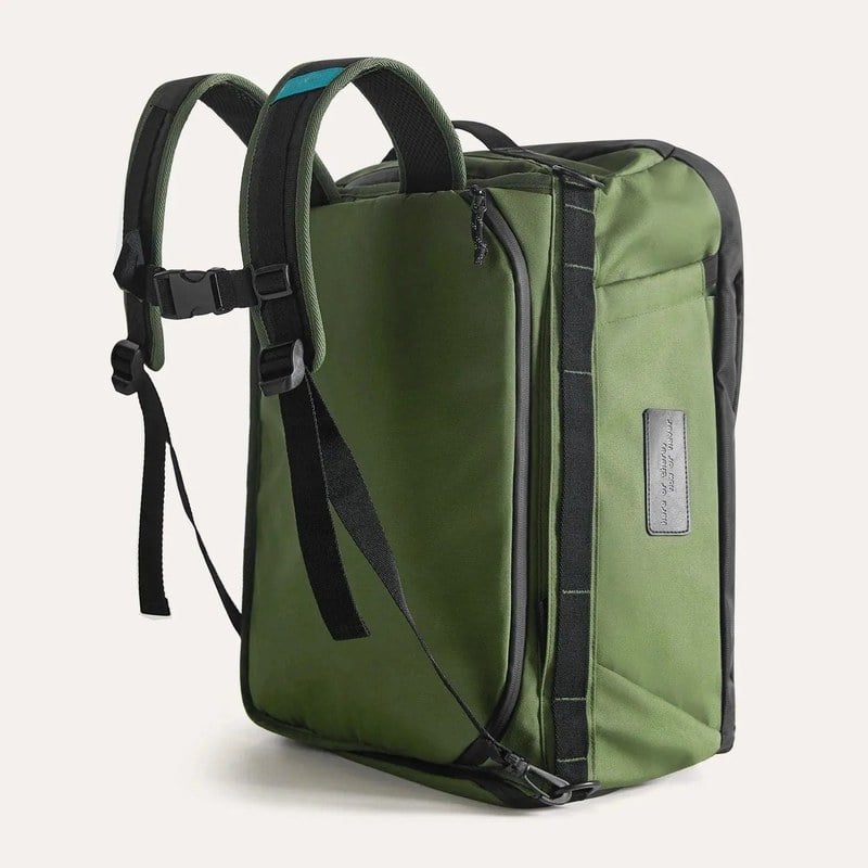 BagSmart Paz 43L duffle backpack in Pesto green shown from the back with the padded backpack straps and sternum strap deployed
