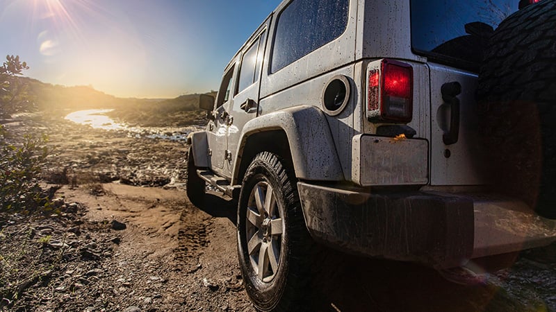 Close-up of a 255/75R17 off-road tire mounted on an SUV