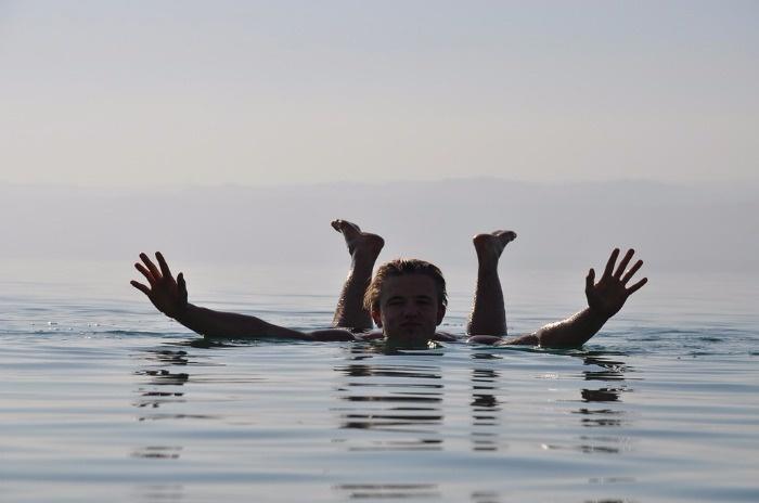swimming in the dead sea israel