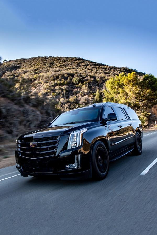 add armor b6 executive escalade action on road