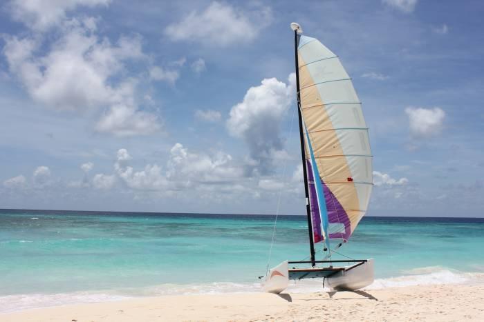 sailboat on beach in barbados