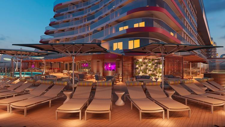 patio pool area at night on carnival mardi gras cruise ship