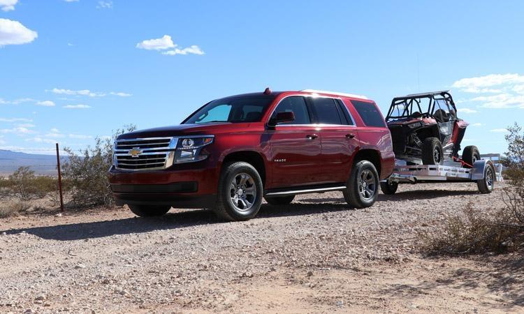 Chevy Tahoe Custom pulling Polaris RZR