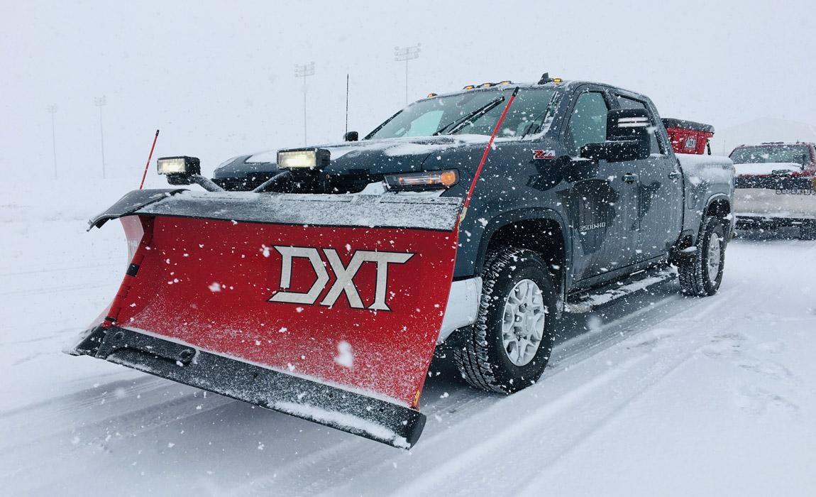 Chevy Silverado plowing snow