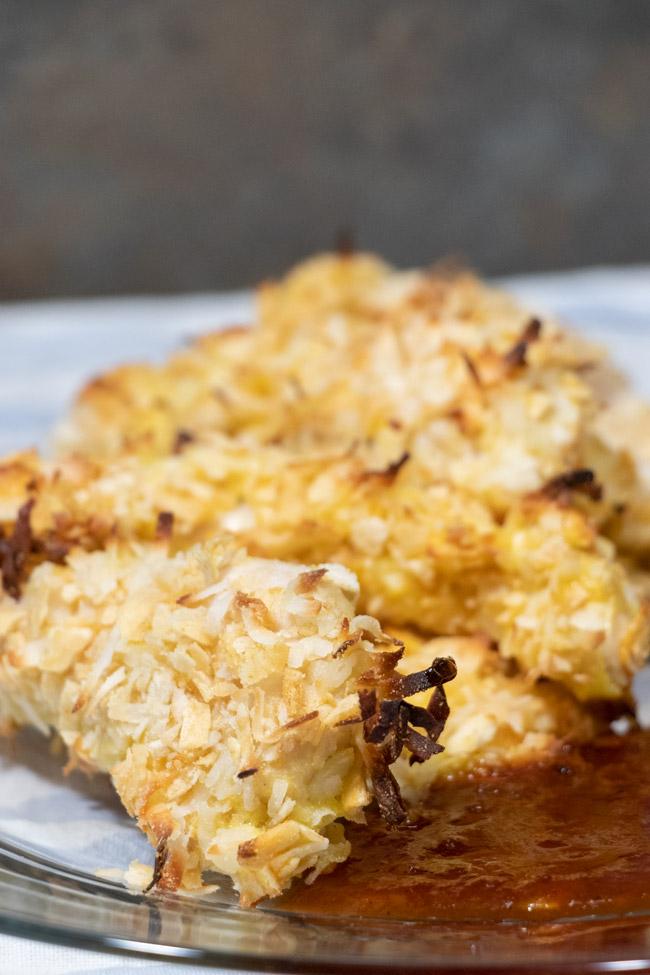 crunch baked coconut chicken tenders with tropical rum sauce