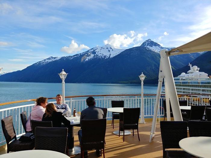 enjoying drinks on aft of norwegian jewel