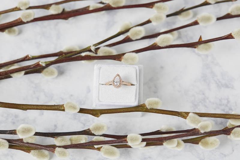 clean origin pear shaped diamond cut engagement ring