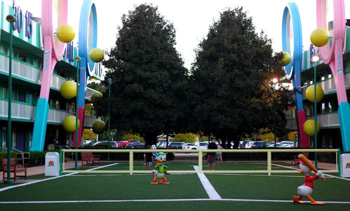 playing tennis courtyard