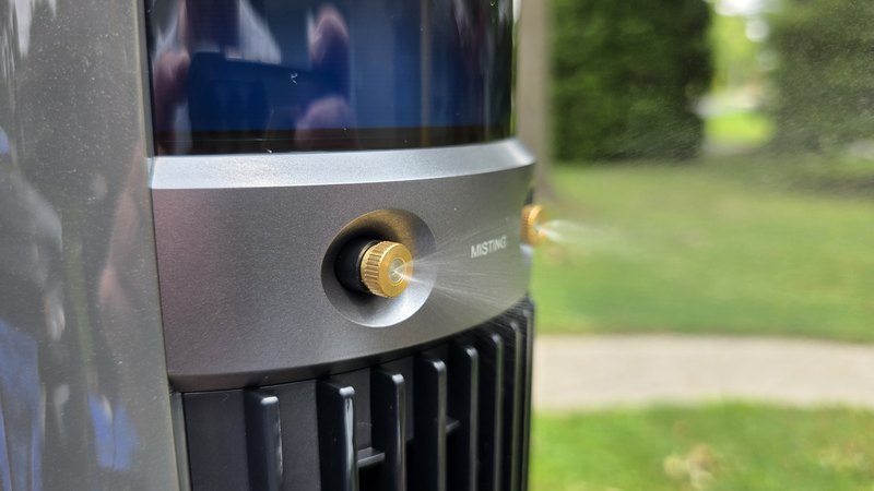 Close up of the two brass misting nozzles on the Dreo TurboCool 711AS spraying mist