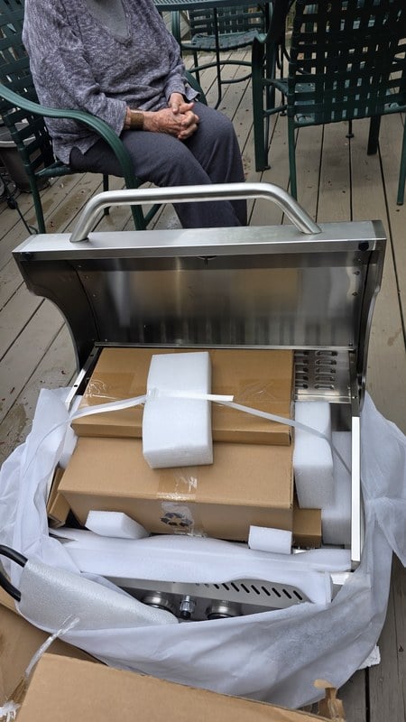 Heather's grandma watching the Electactic G41 Pro arrive in its shipping carton with foam padding still in place