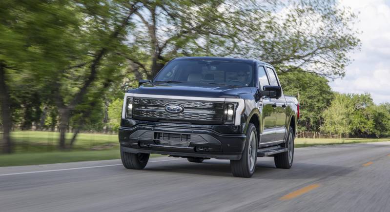 f 150 lightning platinum on road 