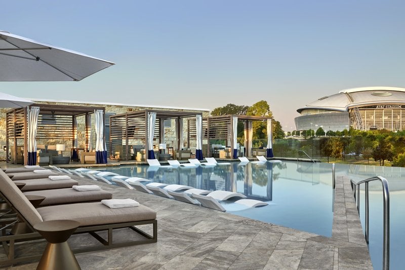 Pool at the Loews hotels in Arlington with AT&T Stadium in view (photo credit: Loews Hotels)
