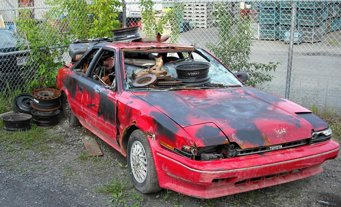 Salvage cars found in a junkyard can be a goldmine for finding cheap parts.