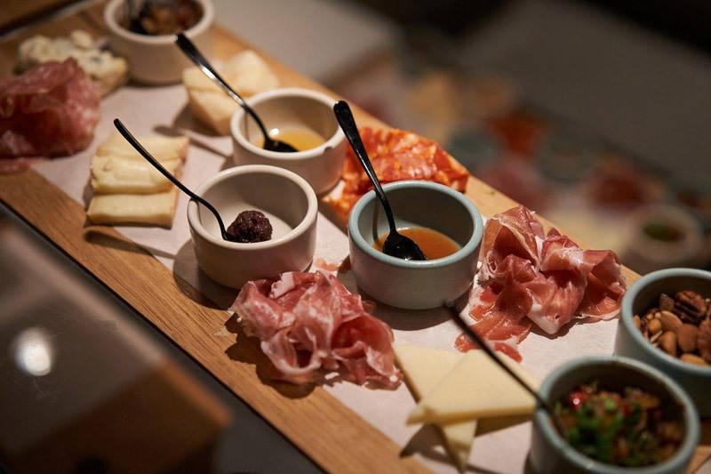 charcuterie board at extra virgin