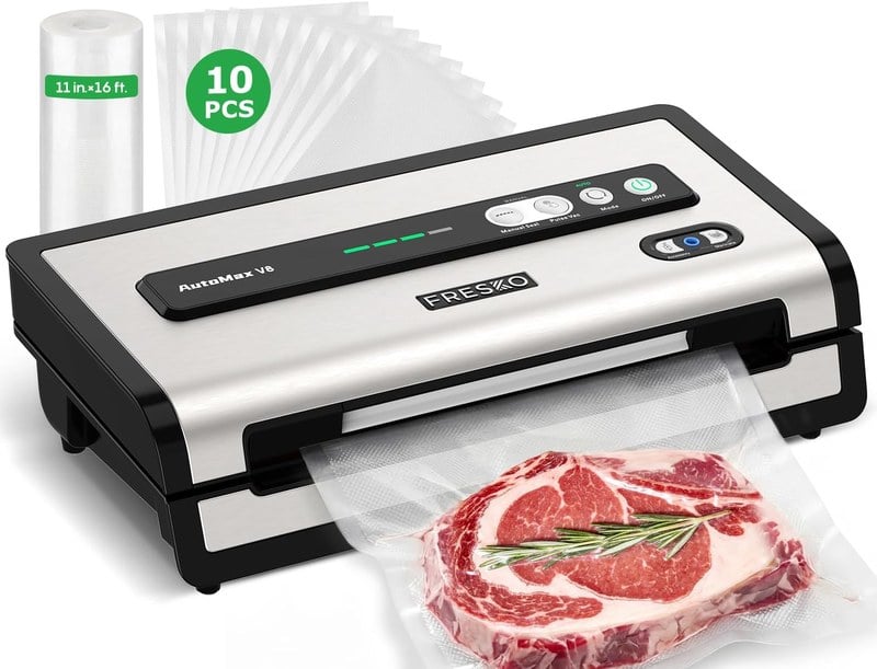 FRESKO AutoMax V8 vacuum sealer with the included 11 inch by 16 foot bag roll, 10 pre-cut bags and a sealed ribeye steak