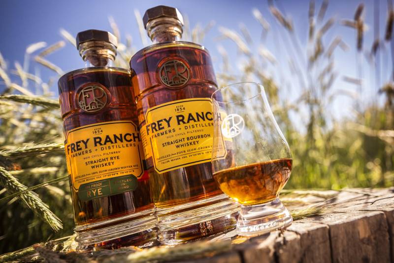 frey rye bourbon glass wood stump