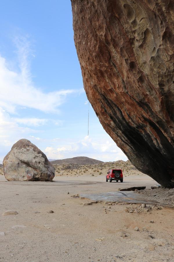 hole under giant rock from explosion in cave house