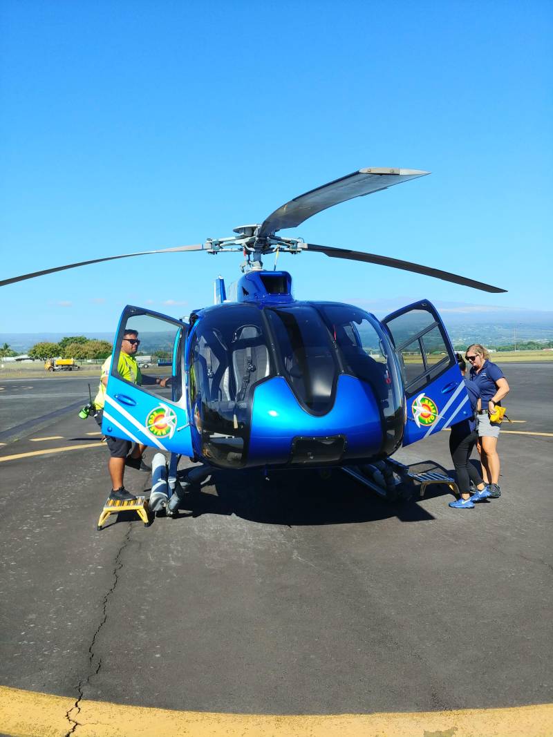 boarding the helicopter in hilo