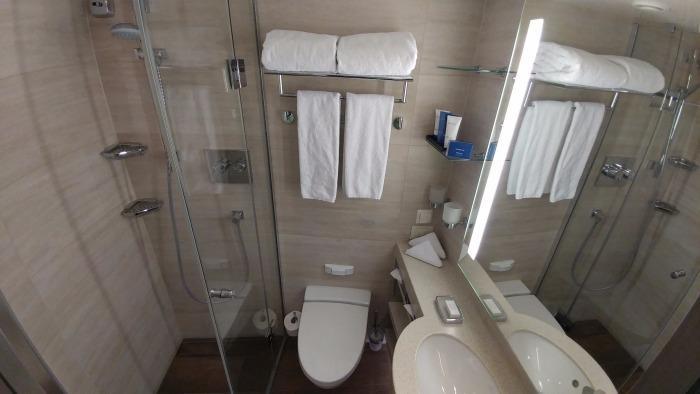 cruise ship bathrooms are especially good since they almost always have a removable shower head allowing you to clean easier