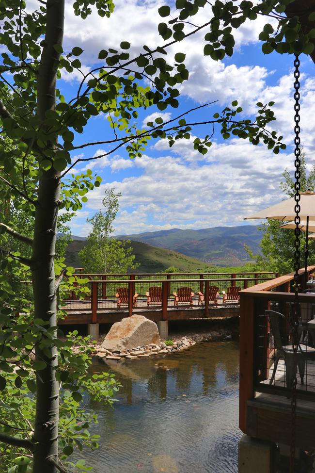 chairs overlooking mountains at high west distillery