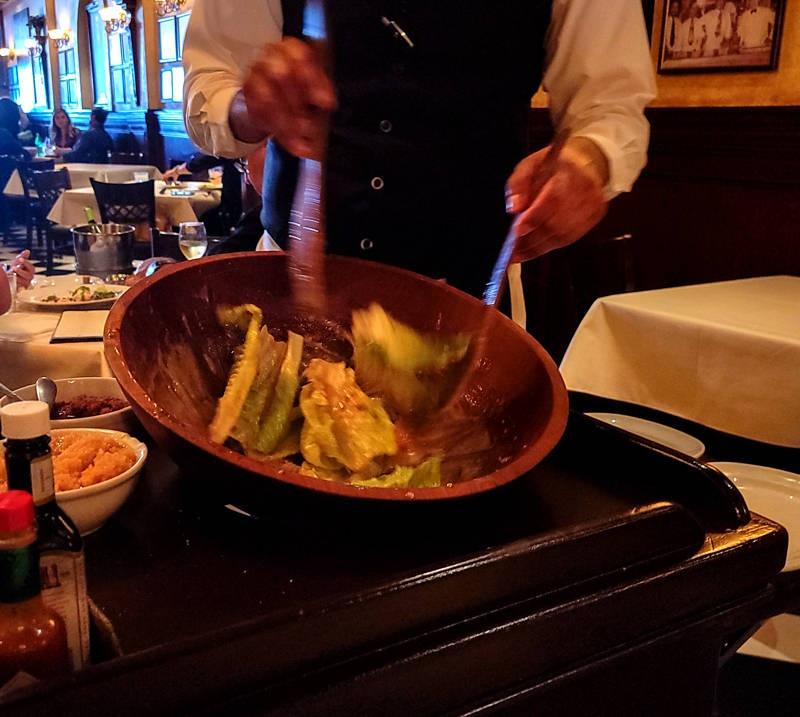 mixing the caesar salad caesars restaurnat tijuana mexico