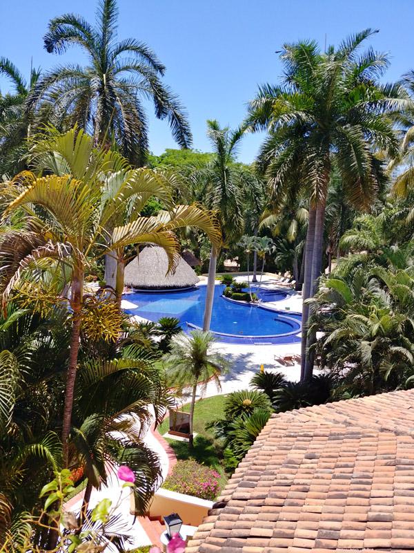 view of casa velas pool from suite