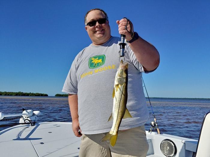 james holding fish caught in charlotte harbor florida