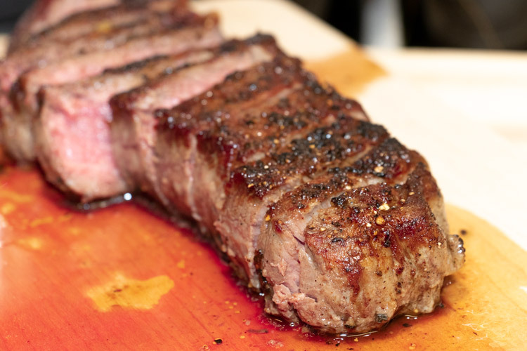 the perfect steak has a beautiful crust created by searing in the skillet