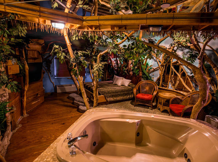 tree house adventure suite at feather nest in nj themed hotel room