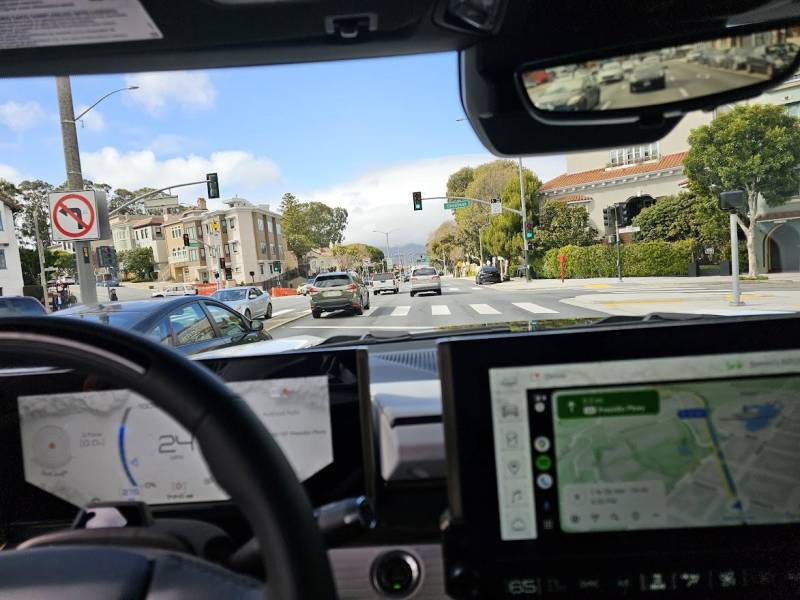Hummer EV SUV driving through San Francisco