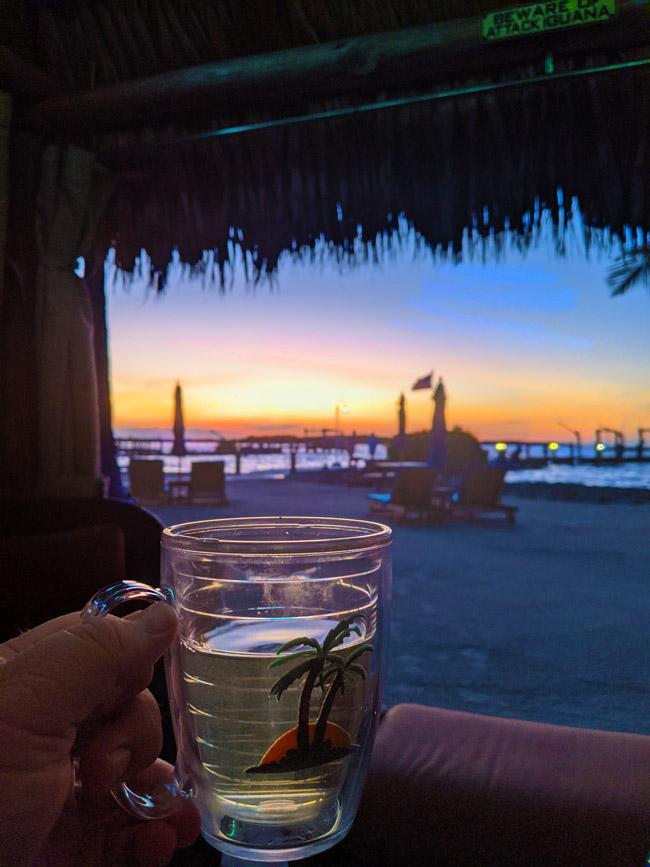 enjoying wine while watching the sun set