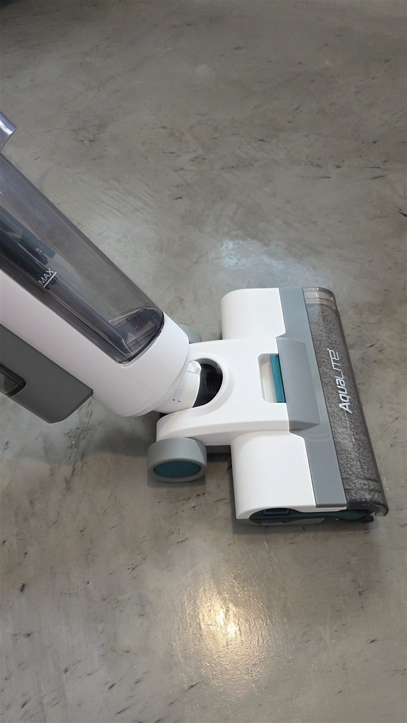 Kenmore AquaLite replaceable brushroll removed from cleaning head showing microfiber roller detail