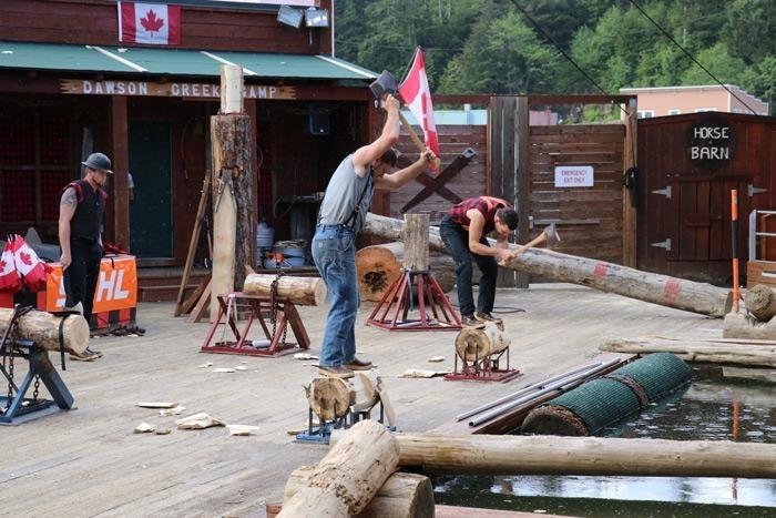 chopping wood at great alaskan lumberjack show ketchikan alaska
